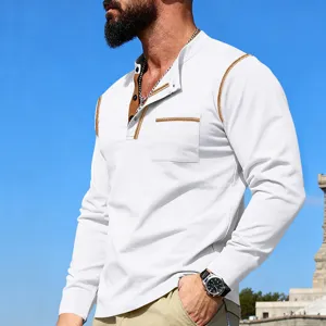 Close-up of men's white long-sleeve Henley shirt featuring contrast stitching and button placket.