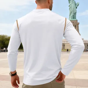 Detail view of men's white long sleeve shirt back, featuring distinctive shoulder seam design.