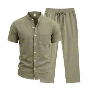 Detailed view of the men's linen short sleeve shirt and trousers set with button placket.