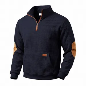 Men's vintage waffle knit quarter-zip pullover sweatshirt with contrast elbow patches.
