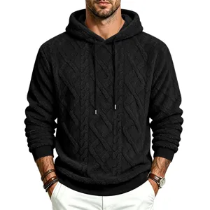 Detail shot of mens black fleece hooded sweatshirt with warm sherpa fabric and cable knit pattern.