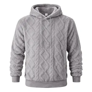 Close-up detail view of thick thermal fleece jacquard hooded sweatshirt for men winter.