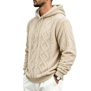 Close-up view of men's thick fleece hooded sweatshirt with cozy cable knit texture detail.