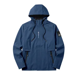Detailed view of the blue men's hooded windbreaker jacket with zipper and sleeve patch.