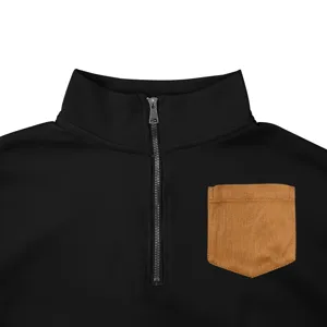 Close-up of men's black half-zip sweatshirt with stylish stand collar and contrast brown pocket.