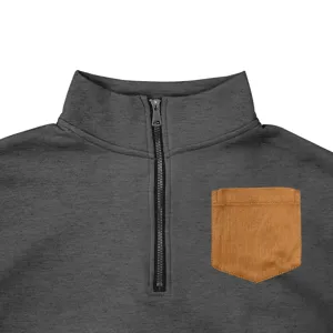 Close-up detail of men's fleece half-zip stand collar sweatshirt with chest pocket.
