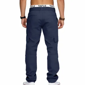 Men's dark blue cargo pants detail view, featuring multi-pocket design and elastic waistband.