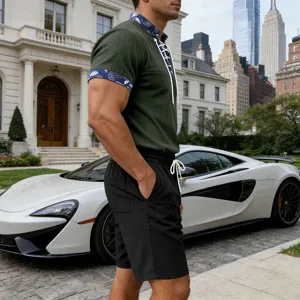 Detailed view of men's summer corduroy short sleeve shirt and shorts set in street scene.