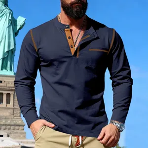 Detail view of men's long sleeve henley shirt with contrast stitching and pocket design.