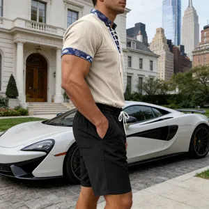 Detailed view of men's summer corduroy short sleeve henley shirt and shorts set outdoor.