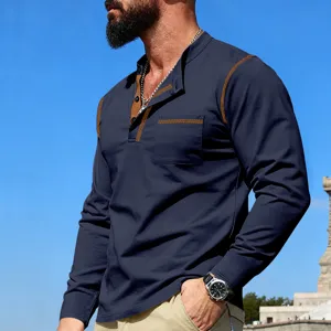 Details of mens long sleeve stand collar polo shirt with contrast color pocket for spring.