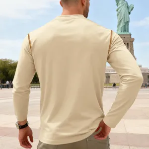 Men's solid beige long sleeve stand collar top back view detail, casual comfortable apparel.