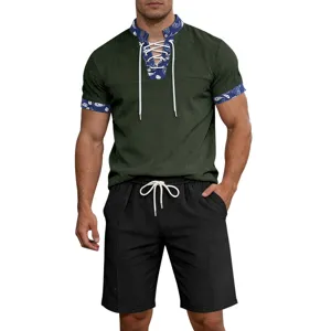 Men summer casual short sleeve henley shirt and black shorts outfit with paisley details.