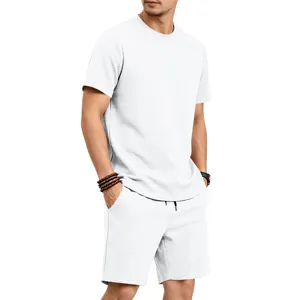 Close-up shot of men textured short sleeve t-shirt and shorts set detail in crisp white.