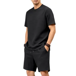Summer men textured short sleeve and shorts set casual loose two piece outfit detail view.