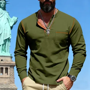 Detailed view of men's military green long sleeve henley shirt with chest pocket and trim.