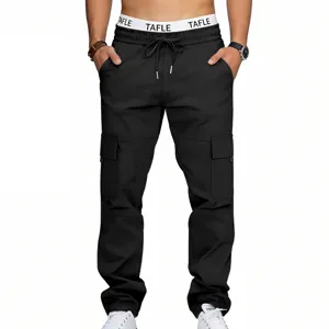 Detailed view of black multi-pocket cargo pants with elastic drawstring waistband and cuffs.