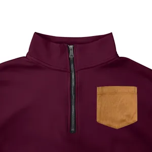 Closeup detail of men's fleece half-zip mock neck sweatshirt with chest pocket design.