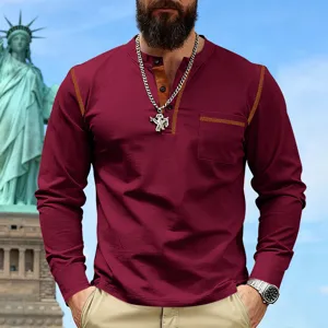Men's burgundy long sleeve Henley shirt detail view showing contrast stitching and chest pocket.