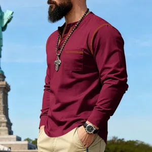 Men's long sleeve henley shirt detail view, featuring contrast stitching and chest pocket.