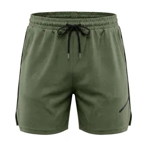 Men's green mesh athletic shorts detail, breathable quick-dry fabric, comfortable drawstring waist.