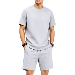 Grey textured t-shirt and shorts set detail, showing soft knit fabric and comfortable fit.