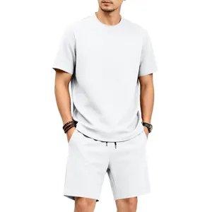 Men summer textured short sleeve t-shirt and shorts set casual loose sportswear outfit.