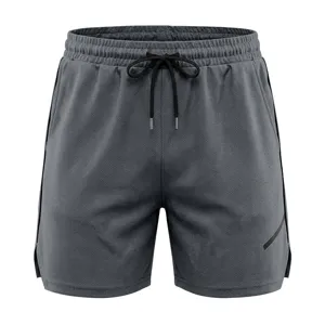 Men's quick-drying mesh athletic shorts detail view, breathable fabric and drawstring waist.