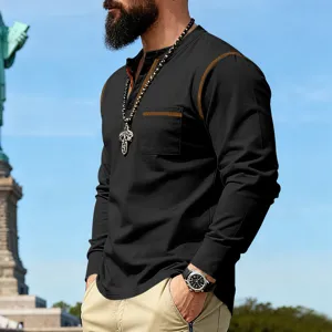Detail shot of men's black long sleeve Henley shirt with contrast stitching and chest pocket.