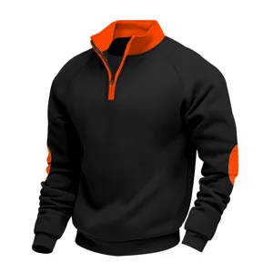 Detailed view of men's fleece-lined stand-collar contrast quarter-zip sweatshirt.