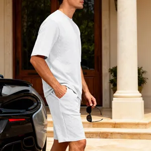 Men's white knit jacquard short sleeve and shorts set lifestyle detail view, casual wear.
