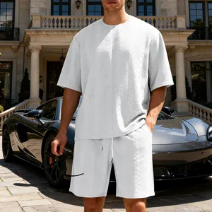 Men's casual loose high street knitted jacquard short sleeve shorts set in white detail view.