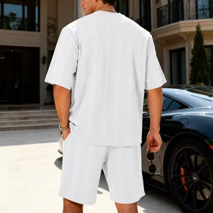 Men's casual oversized knit jacquard short sleeve t-shirt and shorts set in white.