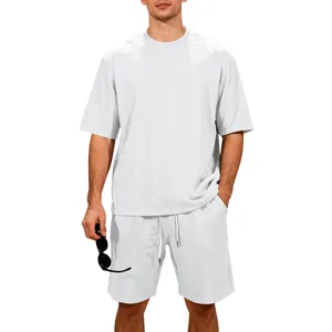 Detailed view of the white knitted jacquard short sleeve t-shirt and matching shorts.