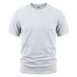 Vue detaillee t-shirt homme texture maille manches courtes, tissu respirant, haut d'ete.