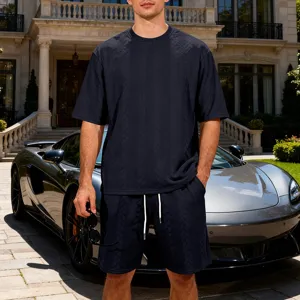 Detail view of the men's casual knit jacquard short sleeve shorts set in navy blue.