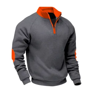 Men's 1/4 zip fleece sweatshirt with contrast orange collar, elbow patches, and relaxed fit.