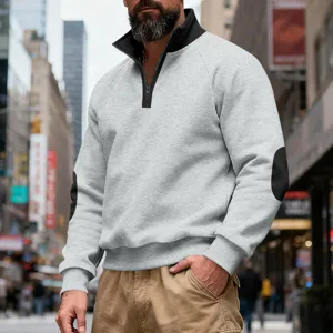 Men's casual loose quarter-zip fleece sweatshirt with stand collar and stylish color-block design.