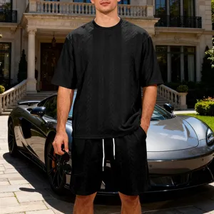 Men's black knitted short sleeve t-shirt and shorts set, casual oversized streetwear look.