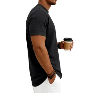 T-shirt à manches courtes texturé noir pour homme, haut d'été jacquard décontracté.