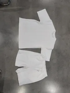 Men white knit short sleeve t-shirt and shorts set, casual streetwear tracksuit outfit.