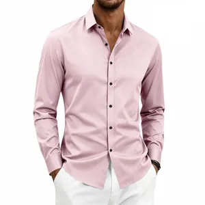 Detailed view of men's classic slim fit long sleeve dress shirt in light pink with black buttons.