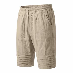 Men's casual summer shorts with drawstring waist and pleated cuffs for vacation wear.