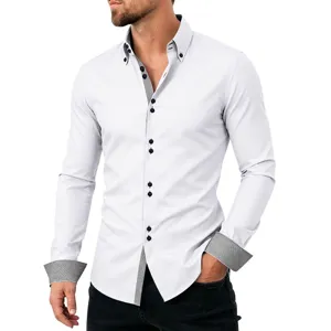 Close-up of mens white long sleeve dress shirt with contrast patterned cuffs and collar details.