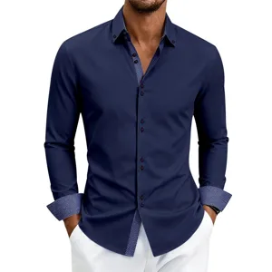 Detail view of mens long sleeve business casual navy dress shirt with contrast print cuffs.