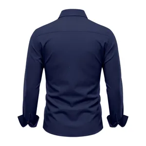 Men's solid navy blue long sleeve dress shirt back view showing collar and button cuffs.