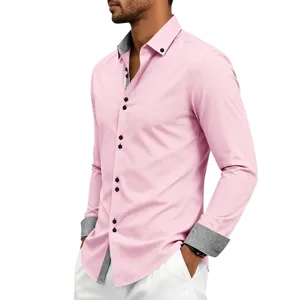 Detailed shot of men's pink long sleeve dress shirt with contrast print cuffs and collar.