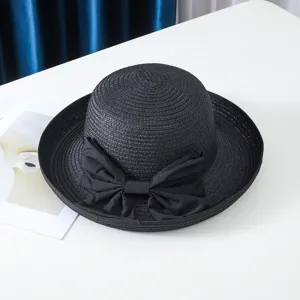 Sombrero de paja negro con lazo elegante para tus vacaciones de verano y proteccion solar.