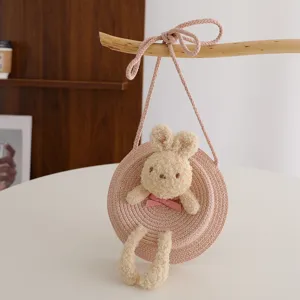 Graziosa borsa rotonda in paglia per bambini con coniglietto di peluche, borsa principessa.