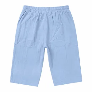Light blue casual men shorts detail, soft elastic drawstring waist, summer vacation style.